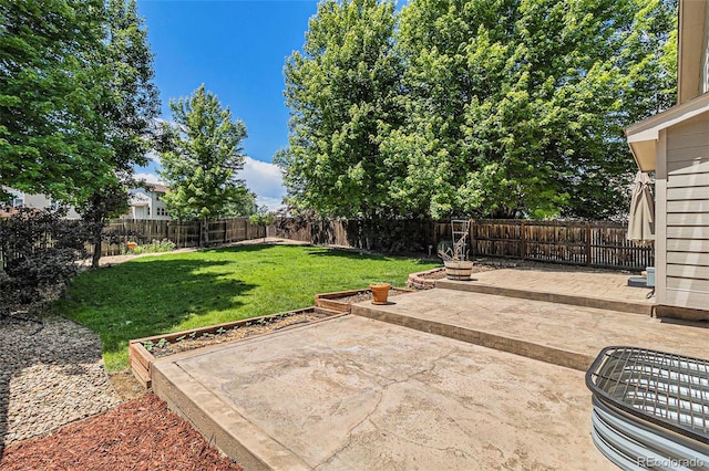 6230 Snowberry Ave, Firestone, CO 80504 - fenced backyard featuring a patio area