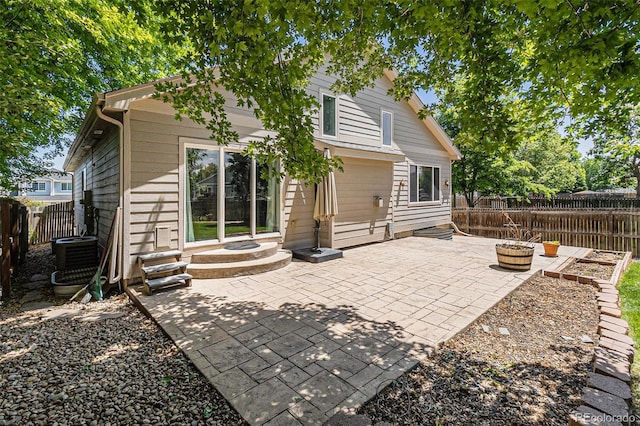 6230 Snowberry Ave, Firestone, CO 80504 - rear view of property featuring a patio and a fenced backyard