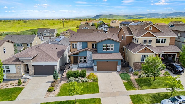 18180 W 84th Pl, Arvada, CO 80007 - aerial perspective of suburban area with a mountainous background