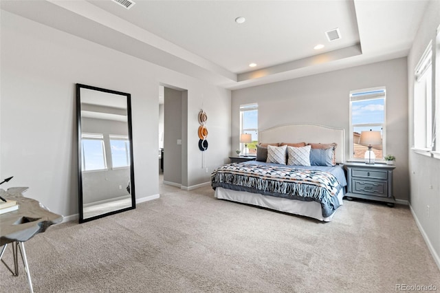 18180 W 84th Pl, Arvada, CO 80007 - bedroom featuring carpet, a tray ceiling, and recessed lighting