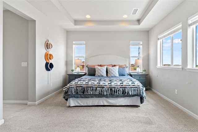 18180 W 84th Pl, Arvada, CO 80007 - carpeted bedroom with a tray ceiling and recessed lighting