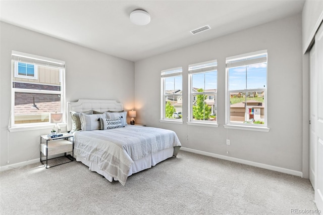 18180 W 84th Pl, Arvada, CO 80007 - carpeted bedroom with baseboards
