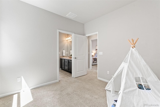 18180 W 84th Pl, Arvada, CO 80007 - rec room with light colored carpet and baseboards