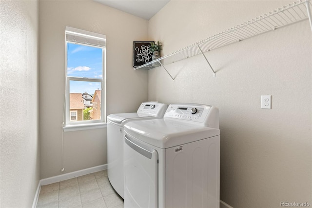 18180 W 84th Pl, Arvada, CO 80007 - laundry area with washing machine and dryer and light tile patterned floors