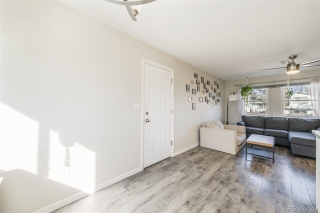 2240 Flintwood Dr, Colorado Springs, CO 80910 - living area featuring a ceiling fan and wood finished floors