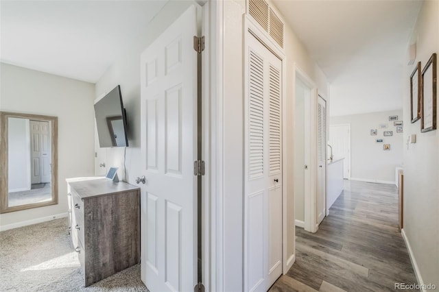 2240 Flintwood Dr, Colorado Springs, CO 80910 - hall featuring baseboards and wood finished floors