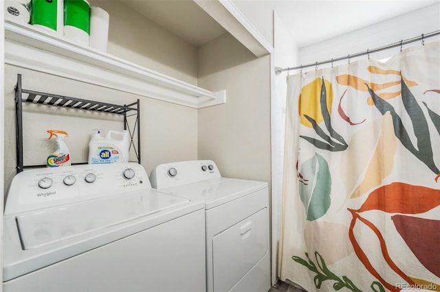 2240 Flintwood Dr, Colorado Springs, CO 80910 - washroom featuring washing machine and clothes dryer