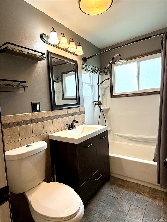 full bathroom featuring tile walls, vanity, shower / bath combination with curtain, and toilet