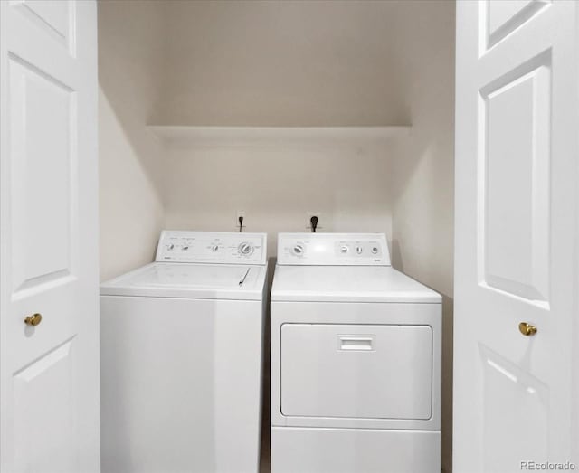 laundry area featuring laundry area and separate washer and dryer