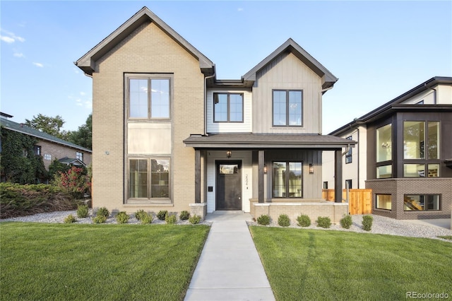 view of front of home with a front lawn