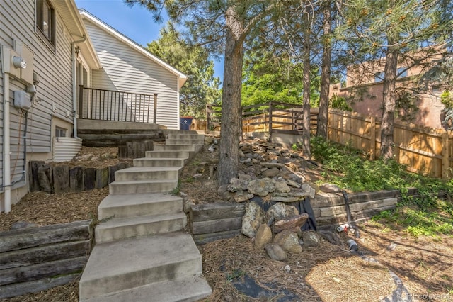 1826 Palm Dr, Colorado Springs, CO 80918 - view of yard with stairs and a wooden deck