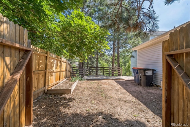 1826 Palm Dr, Colorado Springs, CO 80918 - fenced backyard with a garden