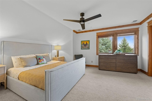 bedroom featuring crown molding, baseboards, and light carpet