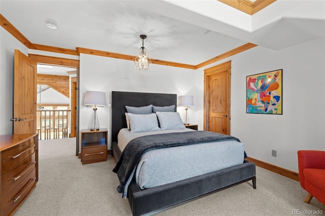 bedroom featuring carpet floors, ornamental molding, and baseboards
