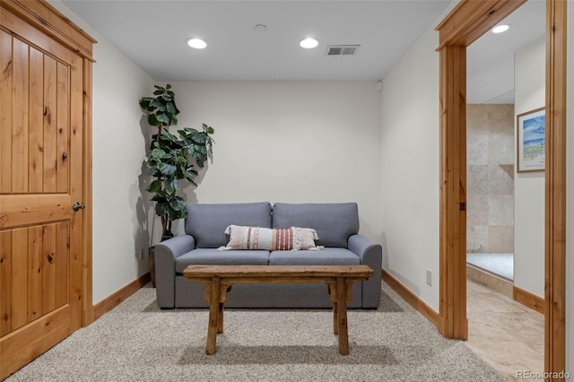 living area featuring recessed lighting, carpet flooring, baseboards, and visible vents