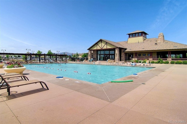 view of swimming pool featuring a patio