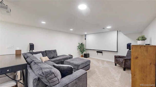 carpeted cinema room featuring baseboards and recessed lighting