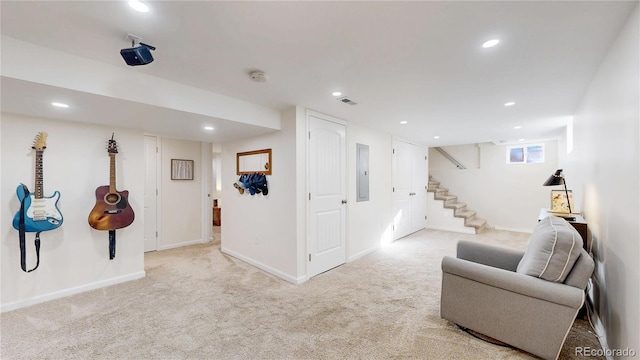 sitting room with recessed lighting, visible vents, stairs, electric panel, and carpet