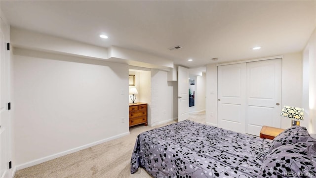 bedroom with recessed lighting, light carpet, visible vents, and baseboards