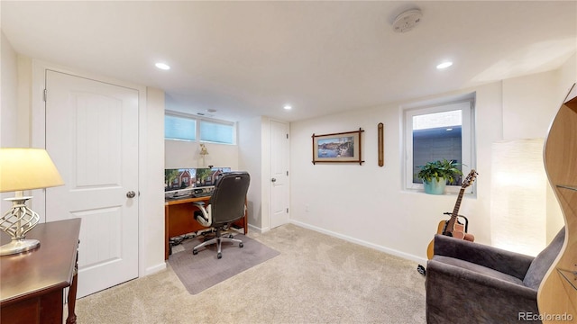 office area featuring light carpet, baseboards, and recessed lighting