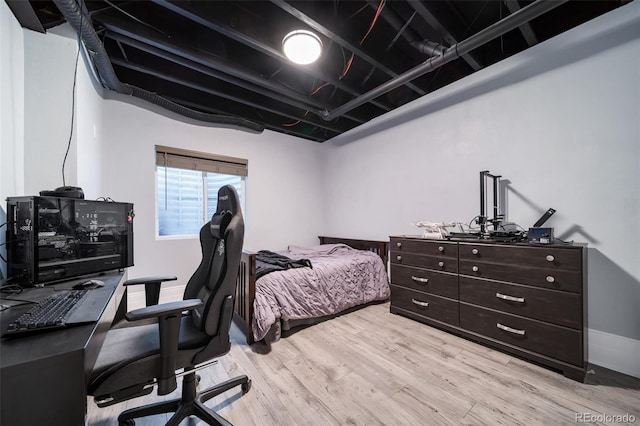 bedroom with light hardwood / wood-style flooring