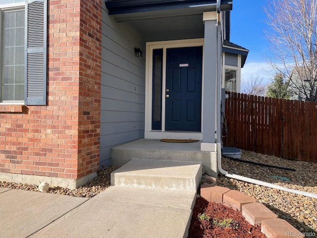 1022 Morning Dove Dr, Longmont, CO 80504 - doorway to property with brick siding