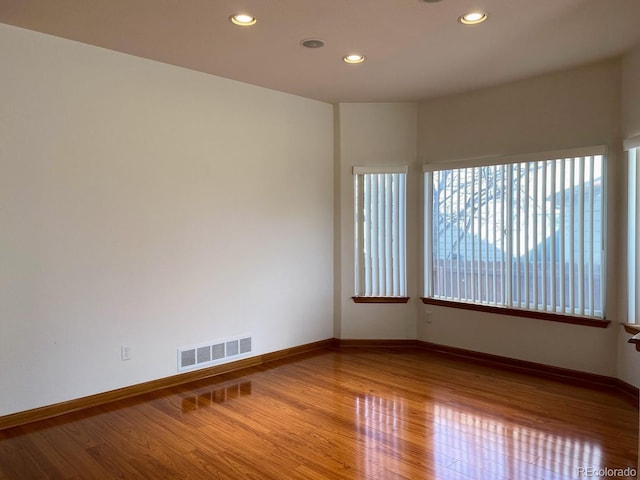 1022 Morning Dove Dr, Longmont, CO 80504 - unfurnished room with wood finished floors, recessed lighting, and baseboards