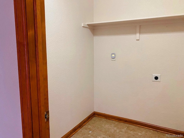 1022 Morning Dove Dr, Longmont, CO 80504 - washroom featuring electric dryer hookup and baseboards