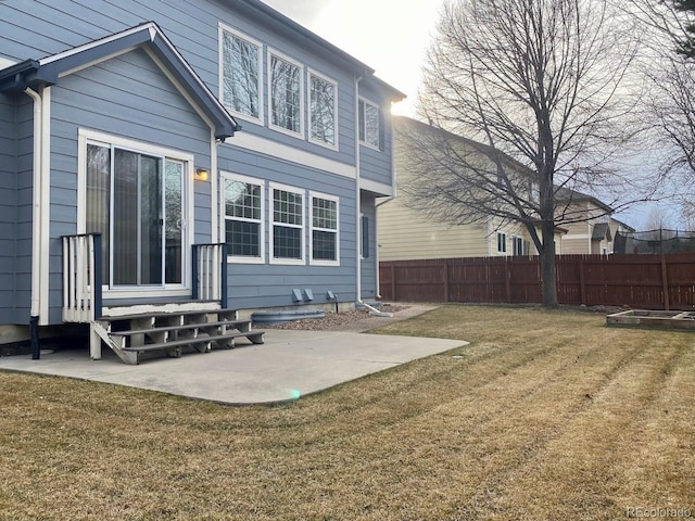 1022 Morning Dove Dr, Longmont, CO 80504 - rear view of house with entry steps and a patio