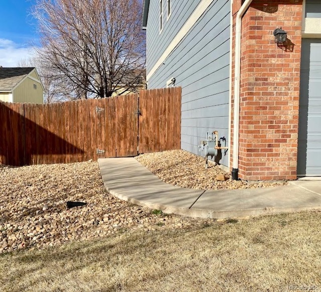 1022 Morning Dove Dr, Longmont, CO 80504 - view of side of home featuring brick siding