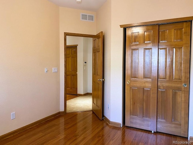 1022 Morning Dove Dr, Longmont, CO 80504 - hallway featuring wood finished floors and baseboards