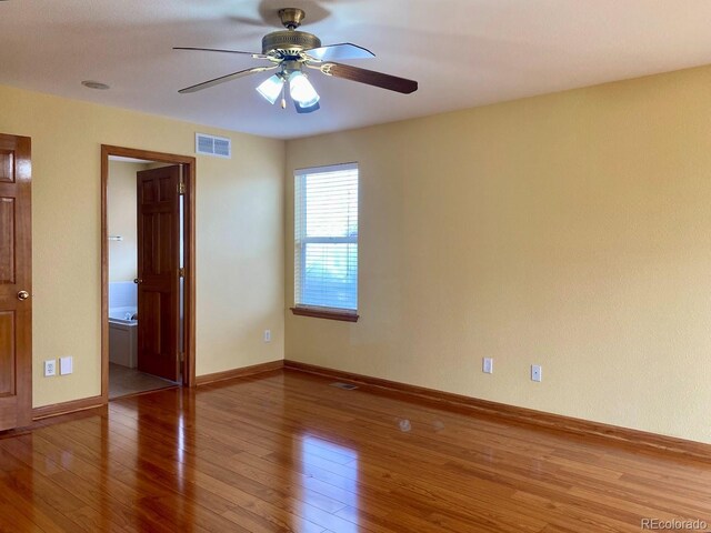 1022 Morning Dove Dr, Longmont, CO 80504 - unfurnished room featuring light wood-type flooring, ceiling fan, and baseboards