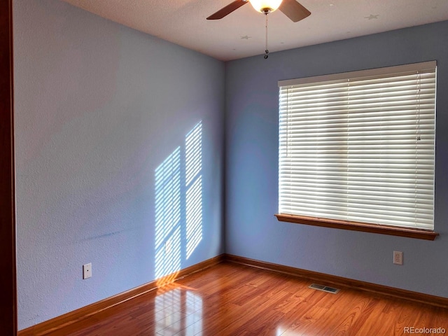 1022 Morning Dove Dr, Longmont, CO 80504 - empty room featuring ceiling fan, light wood-style flooring, and baseboards