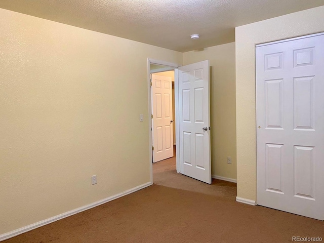 1022 Morning Dove Dr, Longmont, CO 80504 - unfurnished bedroom featuring carpet flooring and baseboards