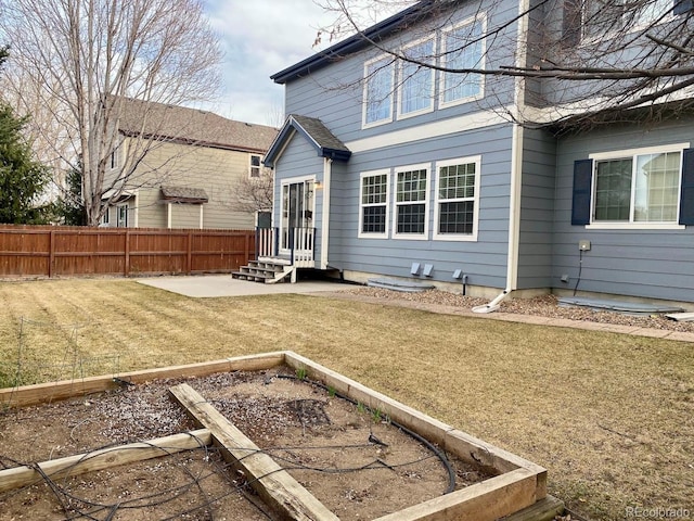1022 Morning Dove Dr, Longmont, CO 80504 - rear view of property with a garden and a patio area