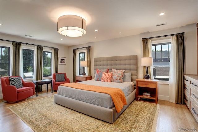 bedroom featuring light hardwood / wood-style floors