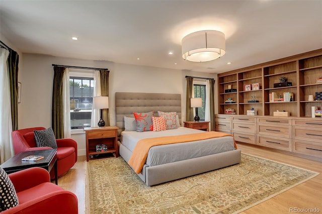 bedroom with hardwood / wood-style flooring