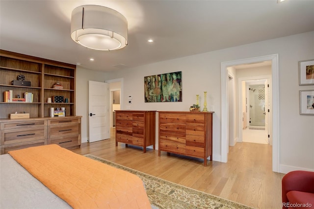 bedroom with light wood-type flooring