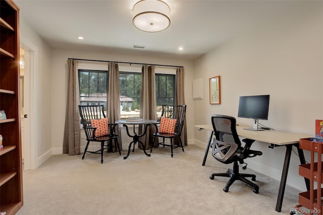 home office featuring light carpet