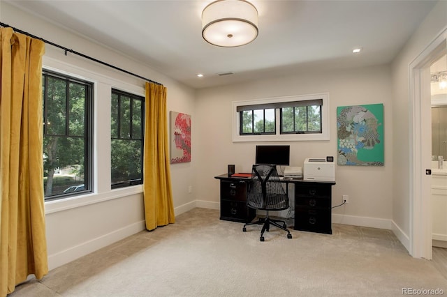 home office featuring light colored carpet