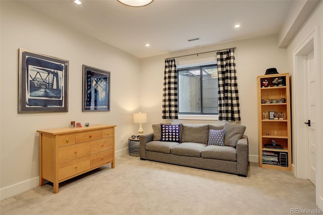 living room with light colored carpet