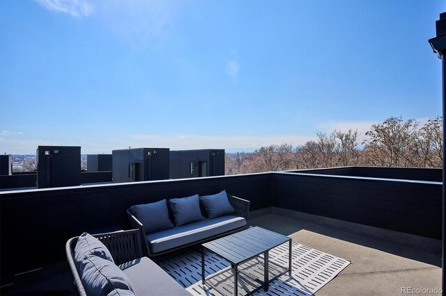 5128 W 26th Ave Unit 101, Denver, CO 80212 - balcony with an outdoor living space