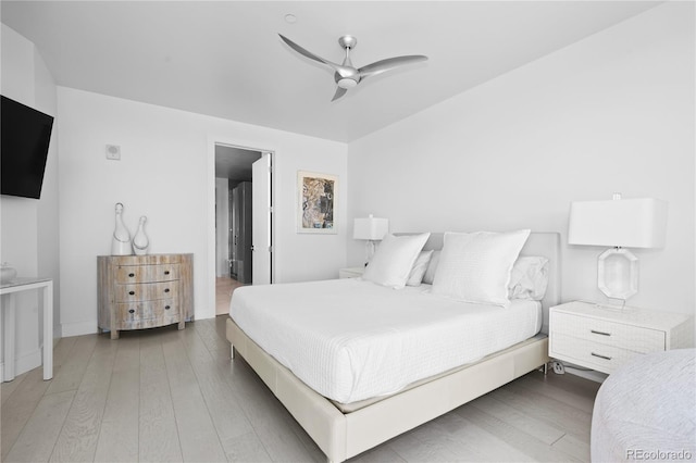 bedroom featuring wood-type flooring and ceiling fan