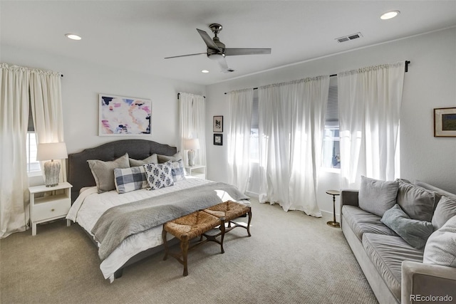 bedroom featuring ceiling fan and carpet flooring