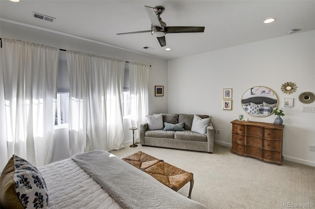 carpeted bedroom featuring ceiling fan