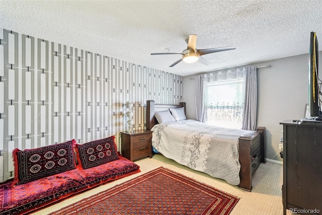 11941 Bellaire St Unit B, Thornton, CO 80233 - carpeted bedroom with a textured ceiling and ceiling fan