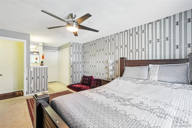 11941 Bellaire St Unit B, Thornton, CO 80233 - bedroom with carpet floors, a textured ceiling, and ceiling fan