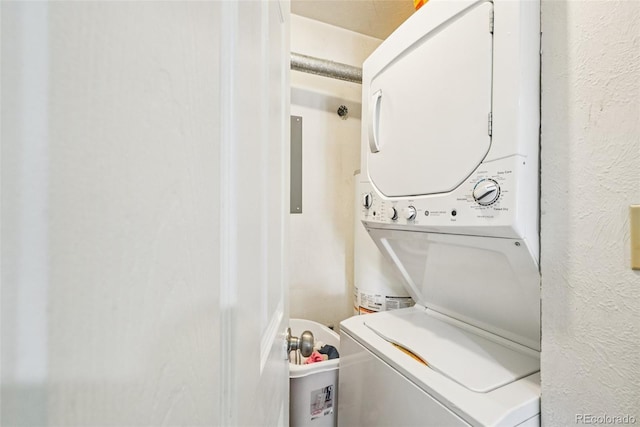 11941 Bellaire St Unit B, Thornton, CO 80233 - laundry room with stacked washer / dryer