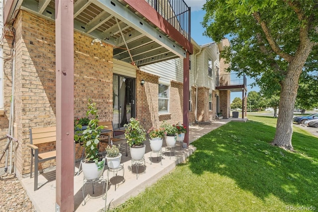 11941 Bellaire St Unit B, Thornton, CO 80233 - view of green lawn featuring a balcony