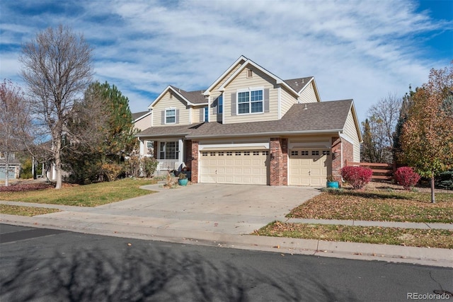 view of front facade with a front lawn and a garage